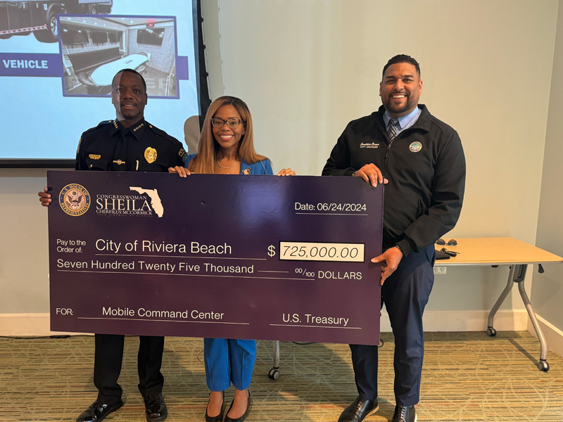 Congresswoman Sheila Cherfilus-McCormick Presents $175k for New Mobile Command Center On Monday, June 24th, 2024, Congresswoman Sheila Cherfilus-McCormick presented the Riviera Beach Police Department with $725k to fund the acquisition of a new mobile command center. This state-of-the-art command center is set to significantly enhance communication and coordination during emergencies and special security events, ensuring the safety and security of the Riviera Beach community. "The support from Congresswoman Cherfilus-McCormick is invaluable," stated Chief Michael Coleman. "This crucial enhancement will improve the department's response capabilities, providing a more robust and effective approach to managing crises and large-scale events." The mobile command center is designed to serve as a fully equipped, on-the-go operations hub, enabling the police department to maintain seamless communication and operational efficiency during critical incidents. It will be instrumental in coordinating efforts during natural disasters, large public gatherings, and other situations requiring rapid and organized response. The formal presentation of the funding check took place at the Marina Event Center, located at 190 E 13th Street, Riviera Beach, FL. The event was well-attended by community members, city officials, and representatives from various emergency services. The presence of the community underscored the shared commitment to public safety and the importance of the new command center in bolstering the city’s emergency preparedness. This new addition to the department's resources marks a significant milestone in its ongoing efforts to enhance public safety infrastructure. The mobile command center will not only improve immediate response times but also ensure that communication lines remain open and effective, even in the most challenging circumstances. The Riviera Beach Police Department remains dedicated to serving the community with integrity and excellence. The support from Congresswoman Cherfilus-McCormick and the federal funding will undoubtedly contribute to a safer and more secure environment for all residents.
