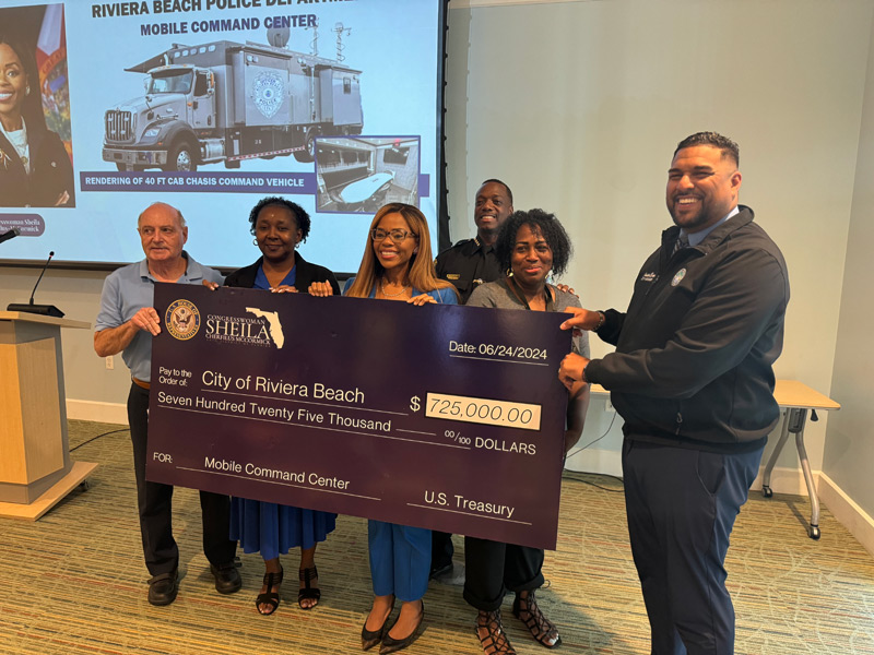 Congresswoman Sheila Cherfilus-McCormick Presents $175k for New Mobile Command Center On Monday, June 24th, 2024, Congresswoman Sheila Cherfilus-McCormick presented the Riviera Beach Police Department with $725k to fund the acquisition of a new mobile command center. This state-of-the-art command center is set to significantly enhance communication and coordination during emergencies and special security events, ensuring the safety and security of the Riviera Beach community. "The support from Congresswoman Cherfilus-McCormick is invaluable," stated Chief Michael Coleman. "This crucial enhancement will improve the department's response capabilities, providing a more robust and effective approach to managing crises and large-scale events." The mobile command center is designed to serve as a fully equipped, on-the-go operations hub, enabling the police department to maintain seamless communication and operational efficiency during critical incidents. It will be instrumental in coordinating efforts during natural disasters, large public gatherings, and other situations requiring rapid and organized response. The formal presentation of the funding check took place at the Marina Event Center, located at 190 E 13th Street, Riviera Beach, FL. The event was well-attended by community members, city officials, and representatives from various emergency services. The presence of the community underscored the shared commitment to public safety and the importance of the new command center in bolstering the city’s emergency preparedness. This new addition to the department's resources marks a significant milestone in its ongoing efforts to enhance public safety infrastructure. The mobile command center will not only improve immediate response times but also ensure that communication lines remain open and effective, even in the most challenging circumstances. The Riviera Beach Police Department remains dedicated to serving the community with integrity and excellence. The support from Congresswoman Cherfilus-McCormick and the federal funding will undoubtedly contribute to a safer and more secure environment for all residents.