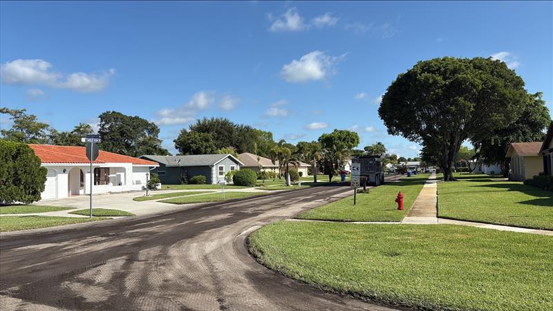 Freshly paved neighborhood street in Riviera Beach